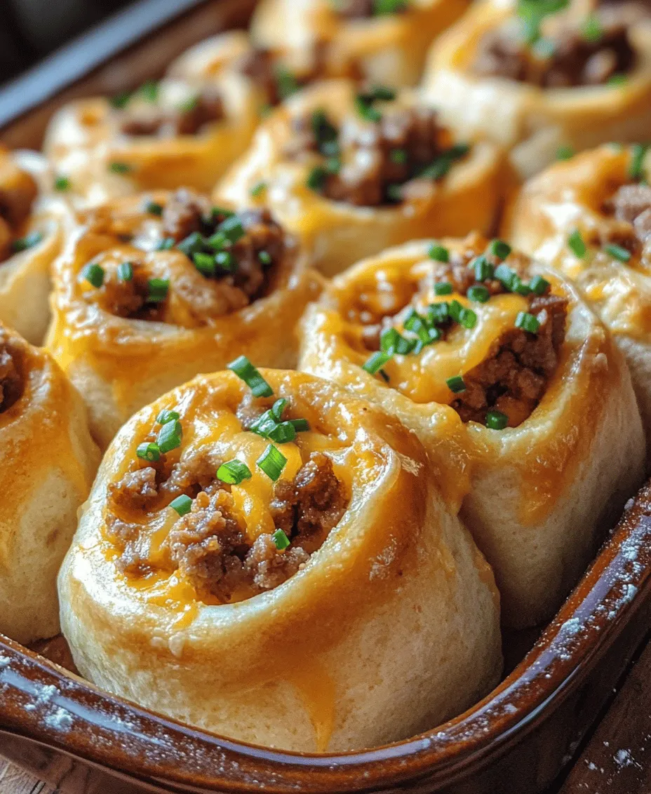 Start your day off on the right foot with a batch of fluffy breakfast rolls that are not just a treat for the eyes but also a delight for the palate. These breakfast rolls are the perfect morning indulgence, combining a soft, airy texture with a savory surprise that will make your taste buds dance. Imagine sinking your teeth into a warm roll, the buttery dough giving way to a hearty filling of breakfast sausage and rich cheddar cheese. This delightful combination makes these rolls an irresistible addition to your breakfast spread, whether you’re entertaining guests or simply treating yourself to a special breakfast.