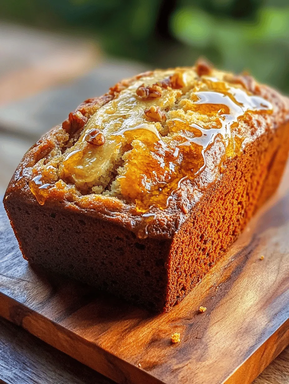 If you've ever experienced the warm, inviting aroma of freshly baked banana bread wafting through your kitchen, you know it’s a treat that can make anyone feel at home. This Honey Vanilla Banana Bread takes that beloved classic and elevates it to new heights with the addition of honey and pure vanilla extract. Imagine a loaf that is not only incredibly moist but also boasts a delightful sweetness from the natural goodness of honey, complemented by the comforting and aromatic notes of vanilla. This recipe stands out in a crowded field of banana breads, transforming an everyday bake into an extraordinary culinary experience.