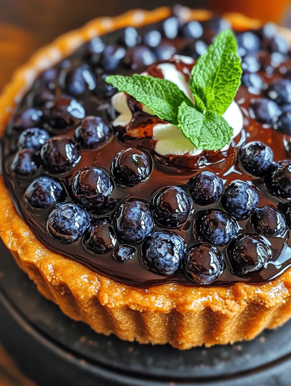 Desserts have a unique ability to evoke joy, nostalgia, and celebration, and The Original Blueberry Ganache Tart encapsulates this beautifully. This tart is not just a dessert; it’s a harmonious blend of rich chocolate and vibrant blueberries, creating a treat that tantalizes the taste buds while also being a feast for the eyes. Each component of the tart contributes to its overall flavor and texture, making it a standout choice for any event, whether it’s a cozy family gathering or a sophisticated soirée.