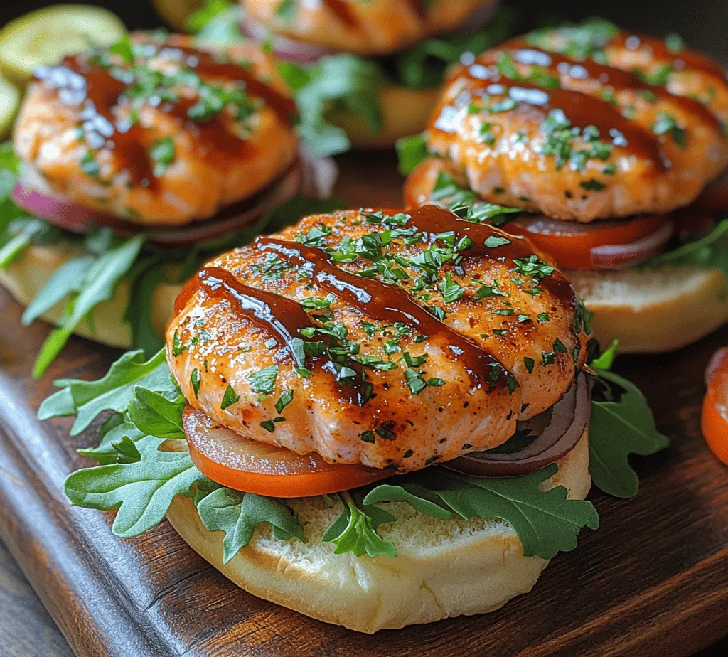 In recent years, sliders have surged in popularity, becoming a staple in contemporary cuisine. These bite-sized sandwich delights offer endless possibilities, allowing chefs and home cooks alike to experiment with flavors and ingredients. From classic beef patties to inventive vegetarian options, sliders cater to diverse palates. Among this ever-expanding array of choices, Smoky BBQ Salmon Sliders stand out as a healthier and incredibly delicious alternative to traditional meat sliders.